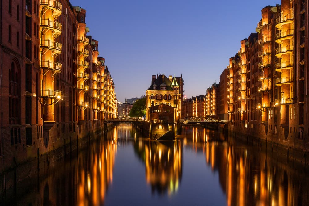 Illuminated Canal City by Rene Tenteris — canvas wall art
