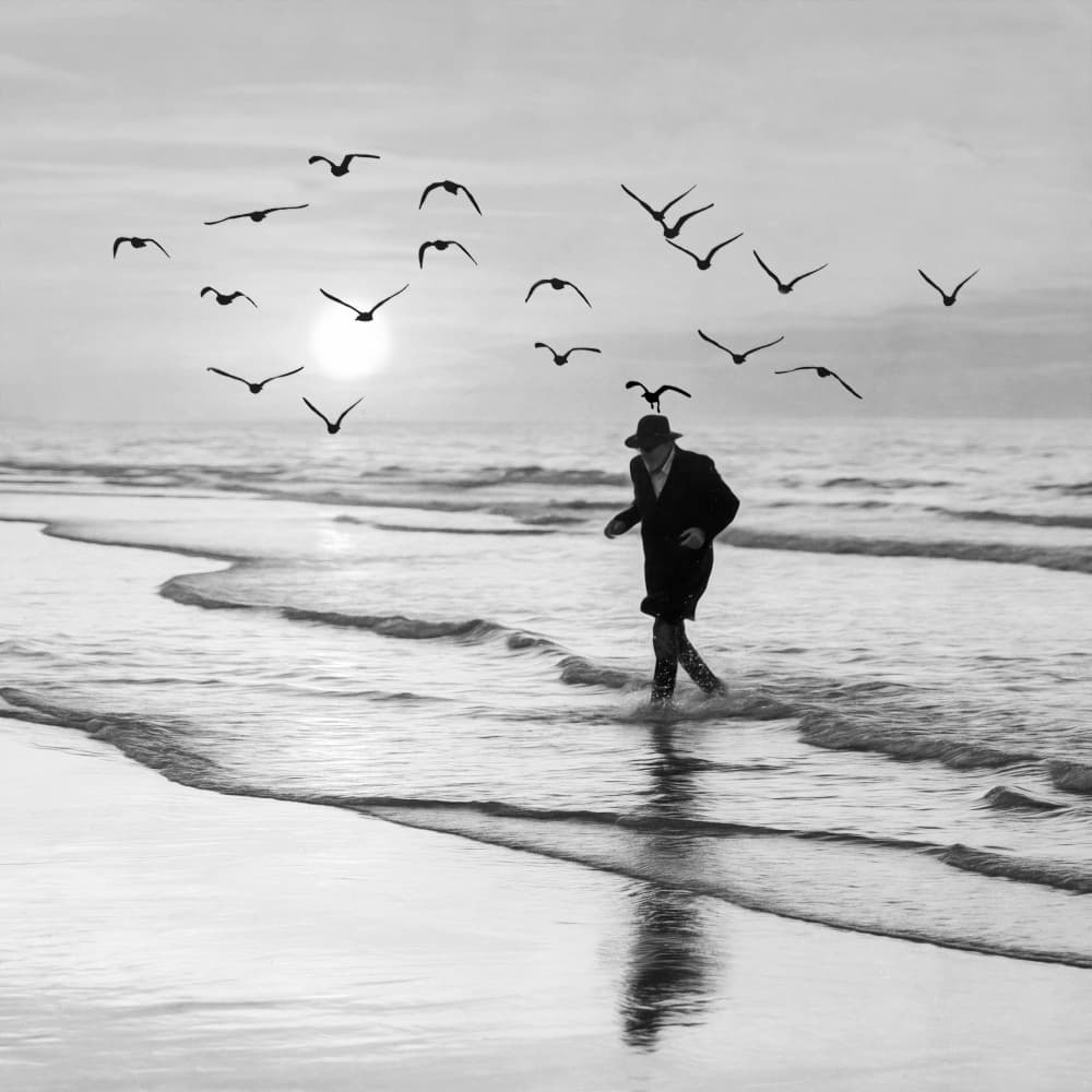 Black and White Beach Walk by Roswitha Schleicher-Schwarz — canvas wall art