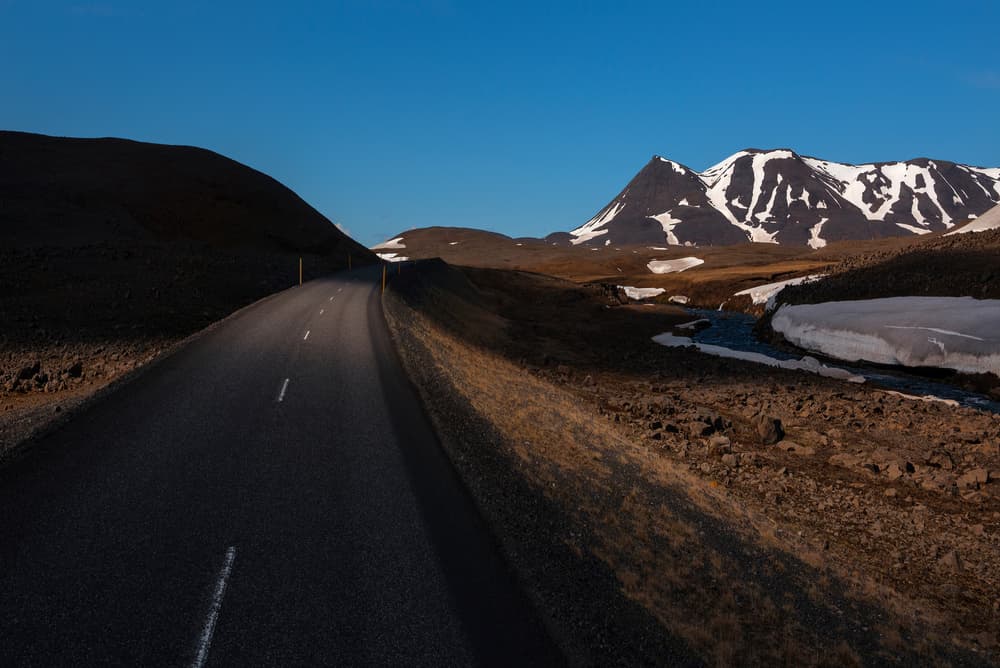 Mountain Road Snow Peaks by Jure Kravanja — canvas wall art