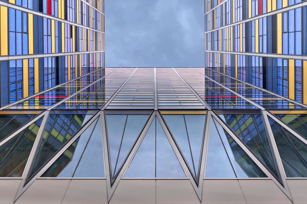 Vibrant City Reflections by Theo Luycx — canvas wall art