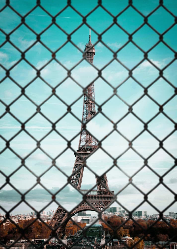 Eiffel Tower Through the Fence by Ariz Rab — canvas wall art
