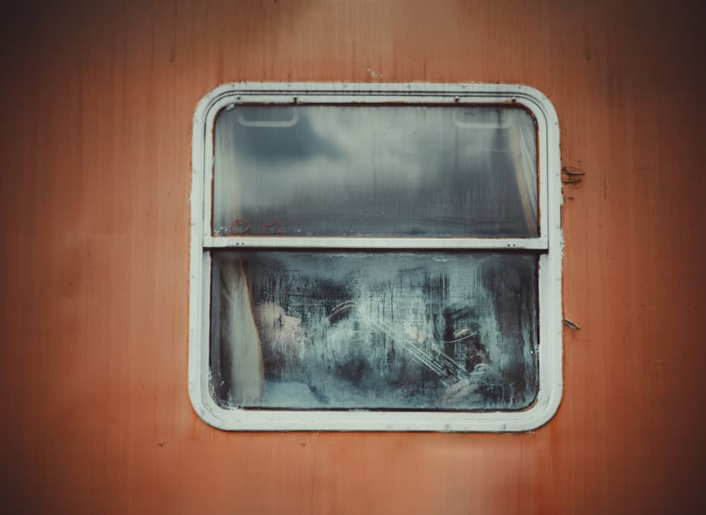 Rusty Train Window by Koki Jovanovic — canvas wall art