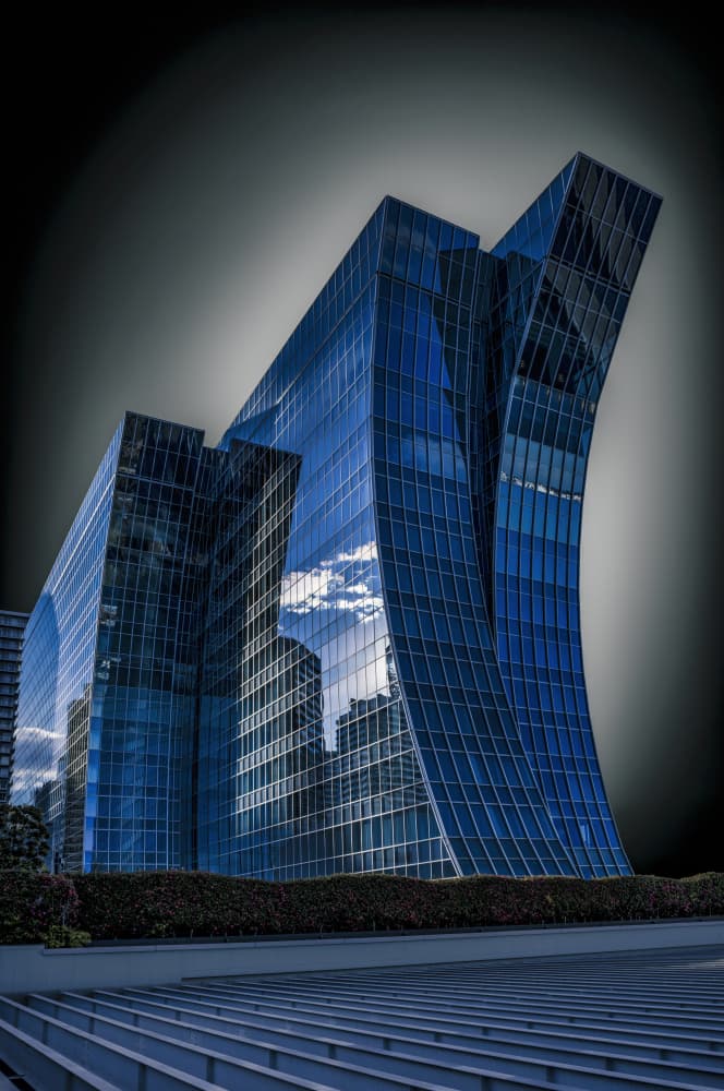 Curved Blue Glass Building by Atsushi Inamura — canvas wall art
