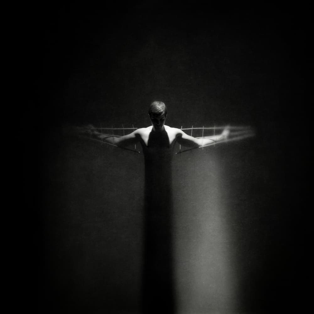 Shadowed Man And Grid by Yaroslav Vasiliev-Apostol — canvas wall art