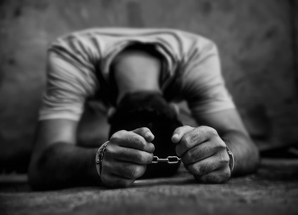 Despair In Handcuffs by Hamze Dashtrazmi — canvas wall art