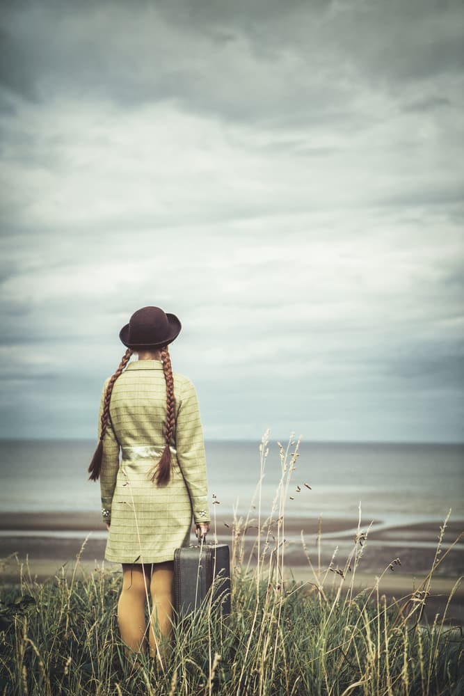 Girl's Seaside Journey by Magdalena Russocka — canvas wall art