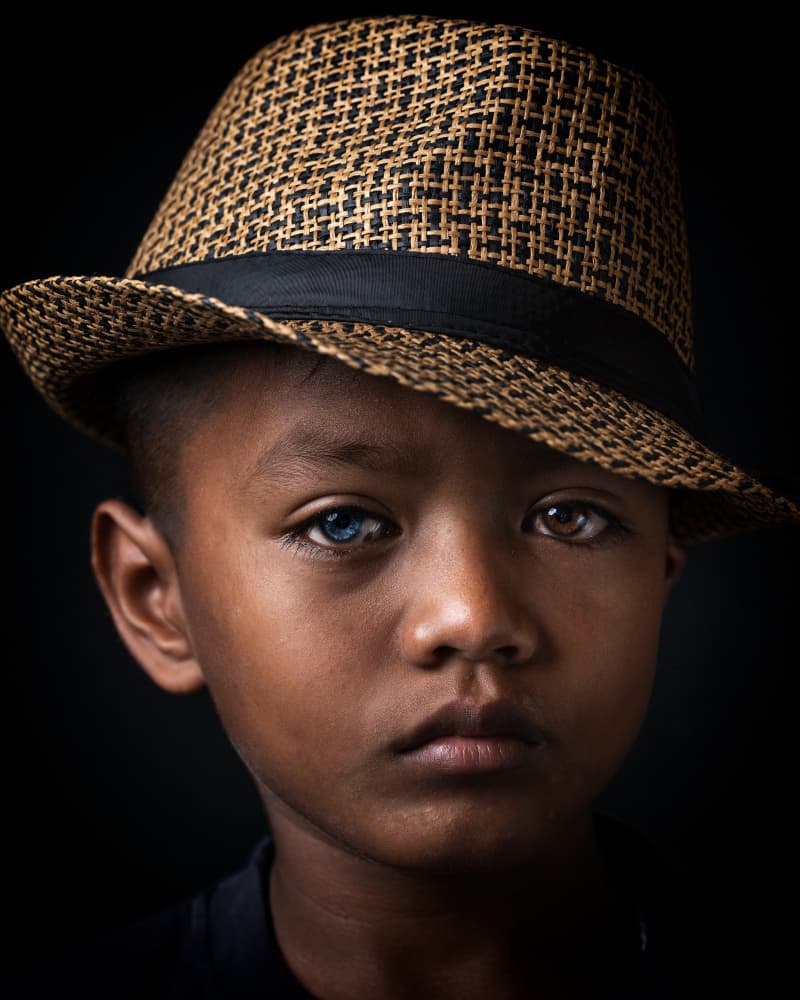 Boy With Unique Eyes by Fira Mikael — canvas wall art