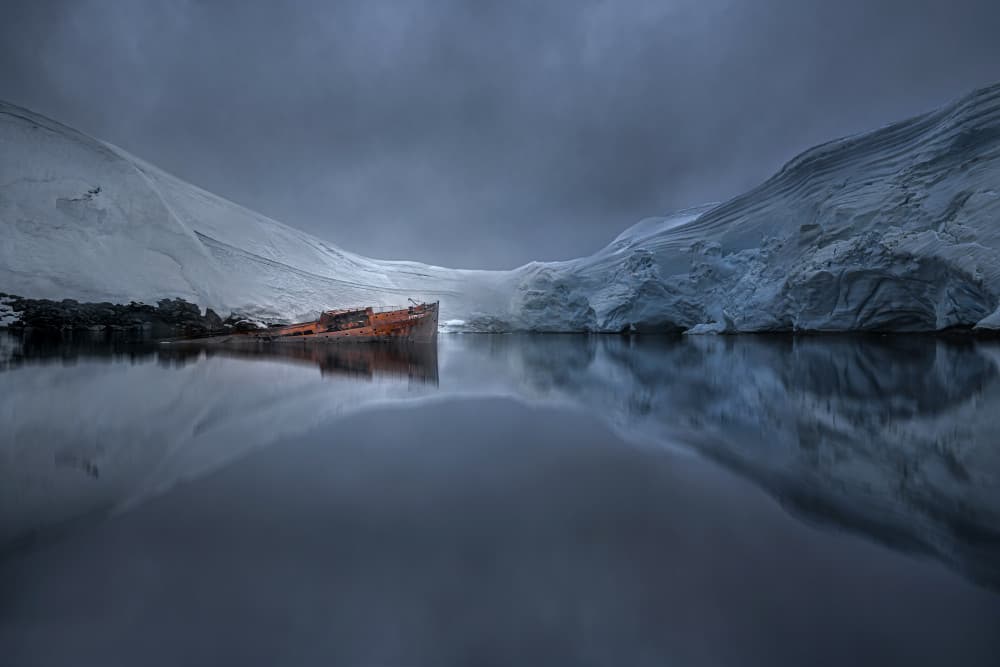 Icy Shipwreck Reflections by John-Mei Zhong — canvas wall art