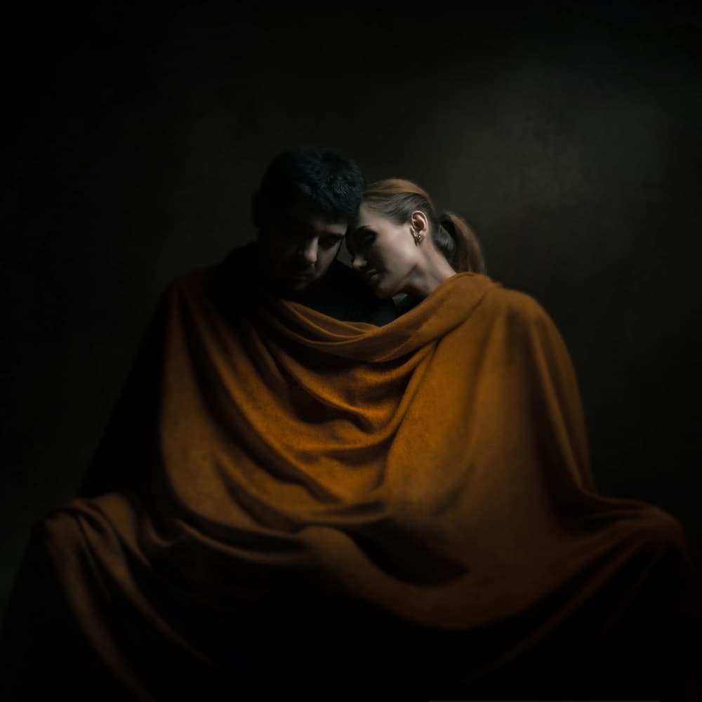 Golden Couple Embrace by Moein Hasheminasab — canvas wall art
