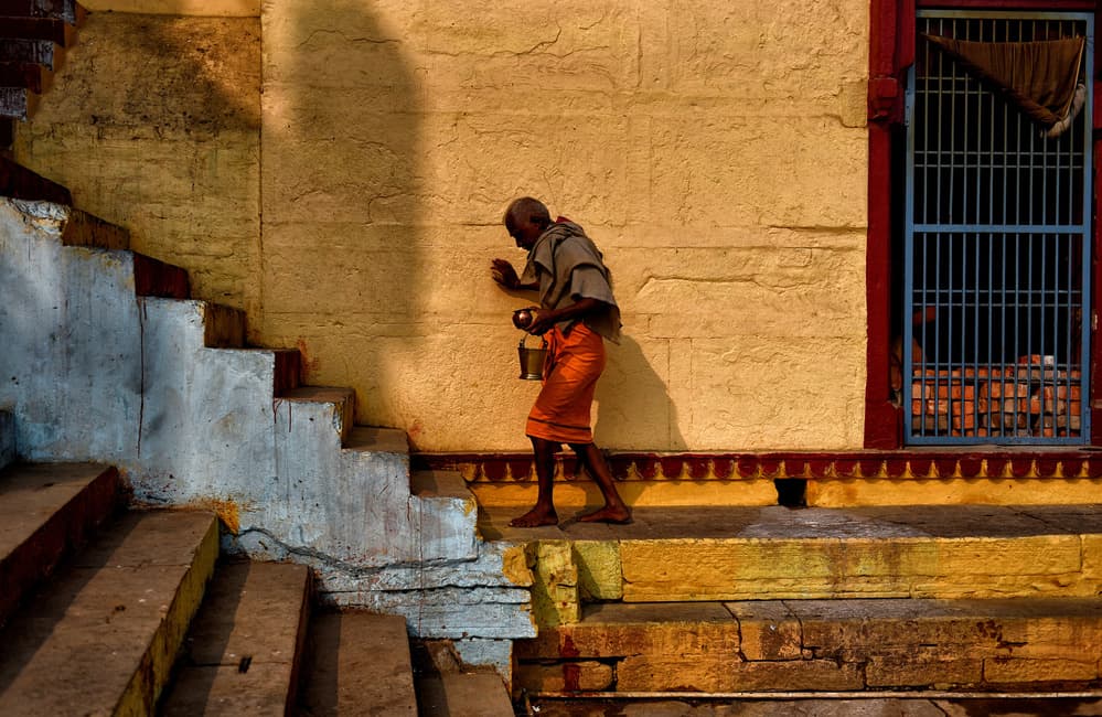 Indian Man on Steps by Avishek Das — canvas wall art