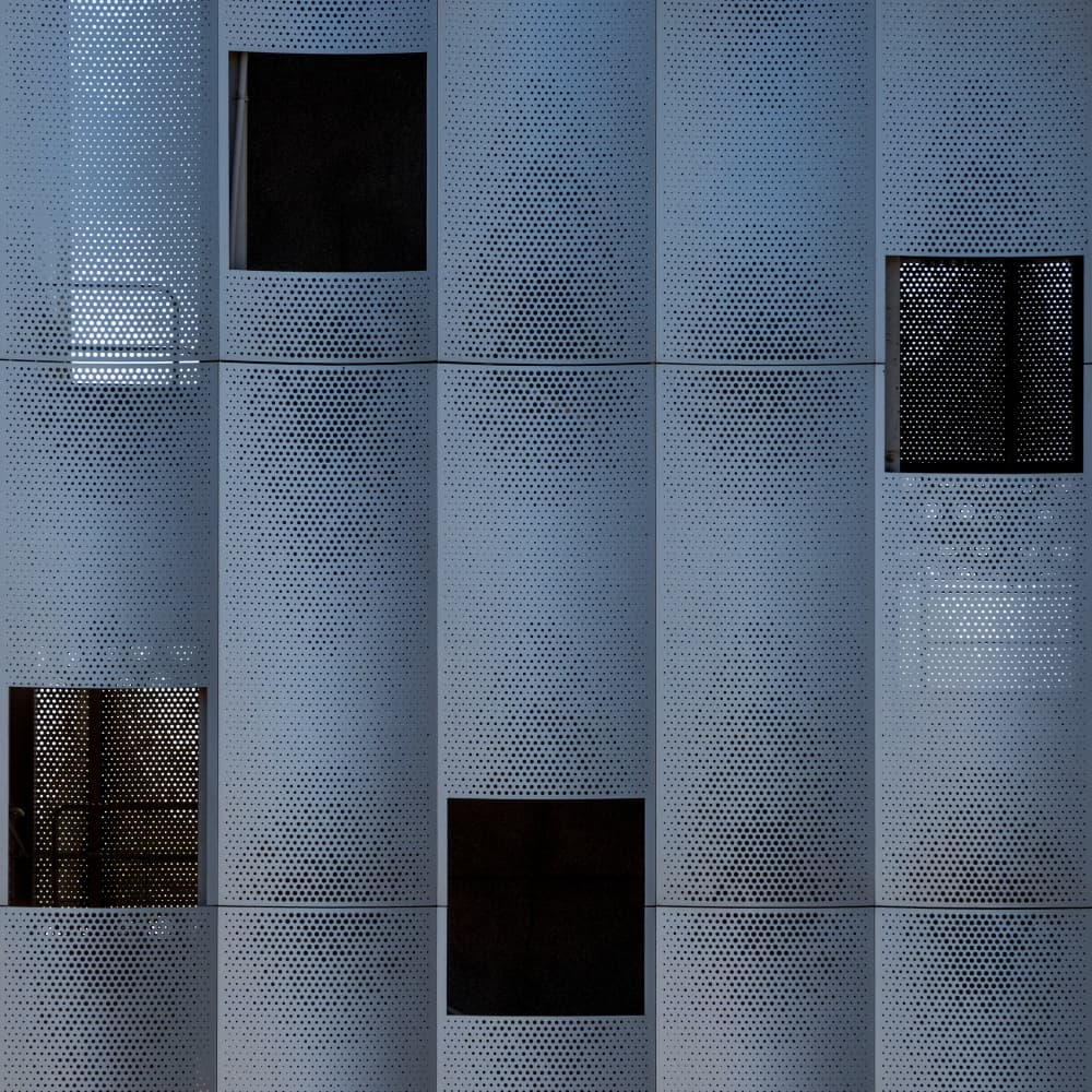 Perforated Building Facade by HAN dong hee — canvas wall art