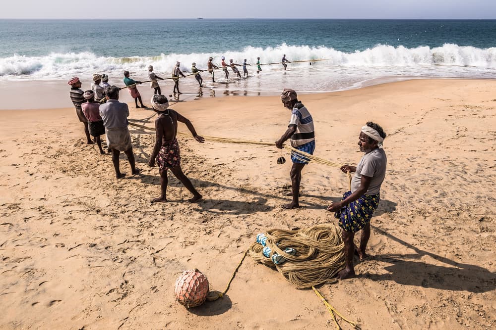 Traditional Beach Fishing by Marco Tagliarino — canvas wall art