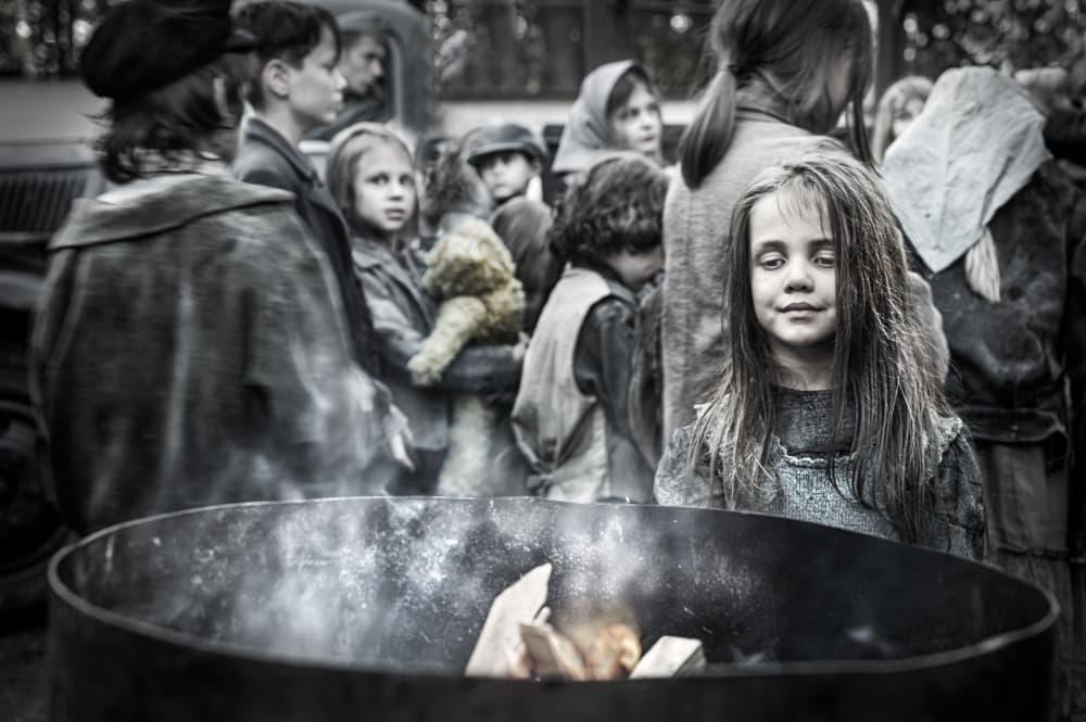 Children Around Barrel Fire by Waldemar Szmidt — canvas wall art