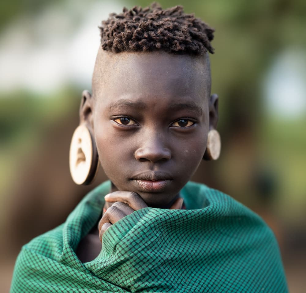 The Girl from the Omo Valley by Hamza Qarooni — canvas wall art
