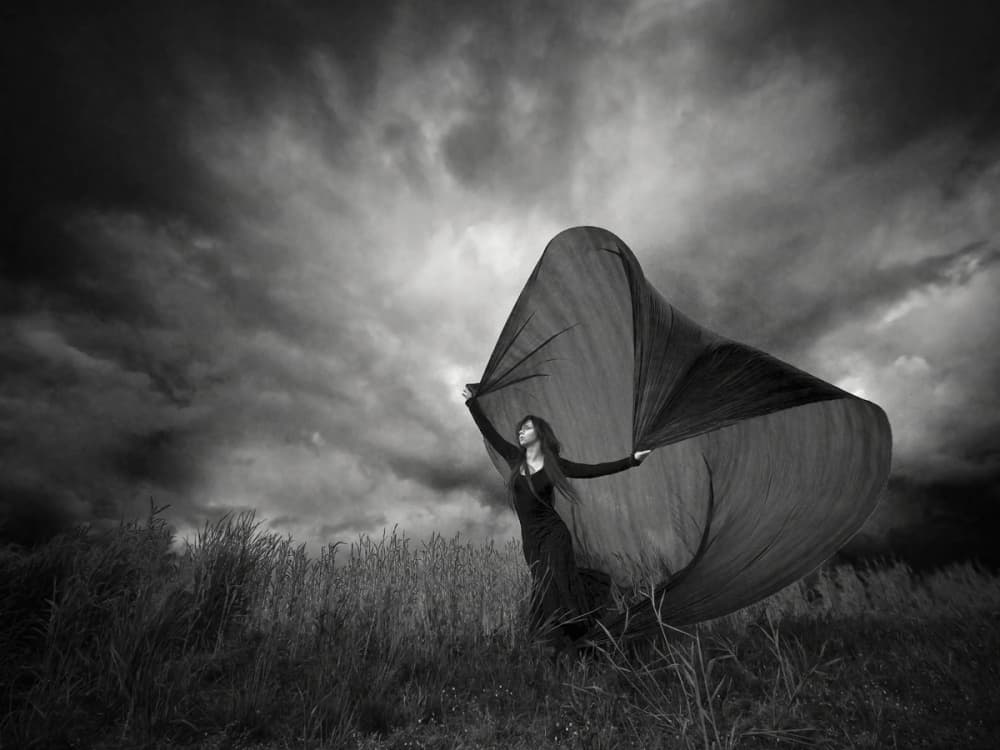 Mysterious Woman Stormy Sky by Leszek Paradowski — canvas wall art