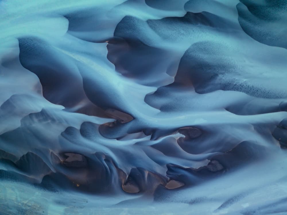 Blue Glacial Flow by Karol Nienartowicz — canvas wall art