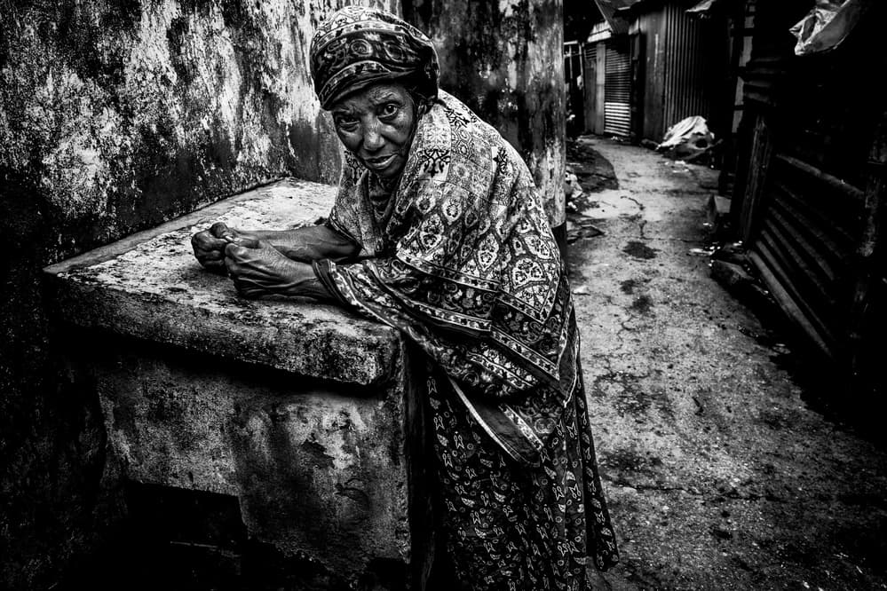 Elderly Woman's Gaze by Joxe Inazio Kuesta Garmendia — canvas wall art
