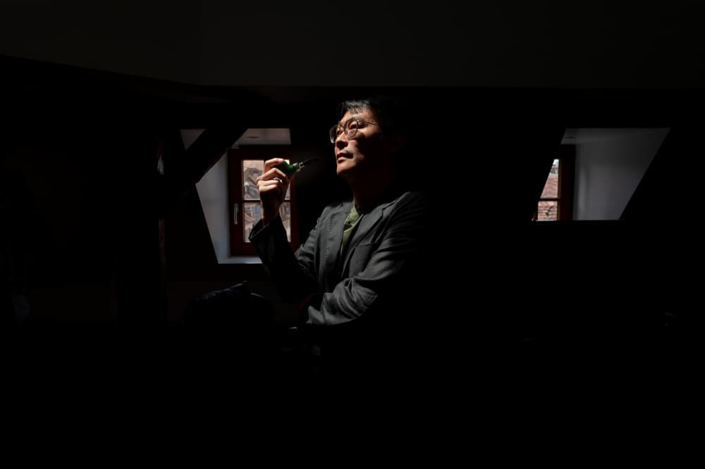 Thoughtful Man by Window by Alan Kwang — canvas wall art