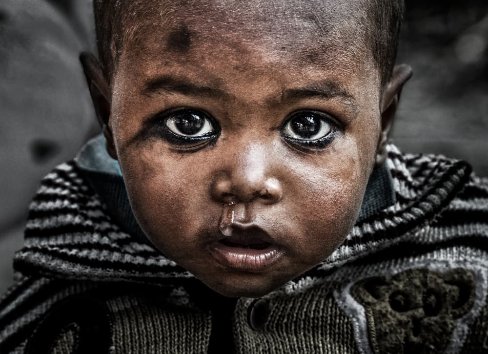 Soulful Child's Gaze by Joxe Inazio Kuesta Garmendia — canvas wall art