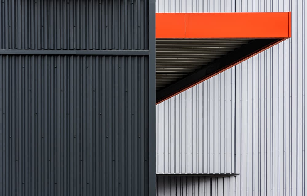 Geometric Orange Architecture by Henk van Maastricht — canvas wall art
