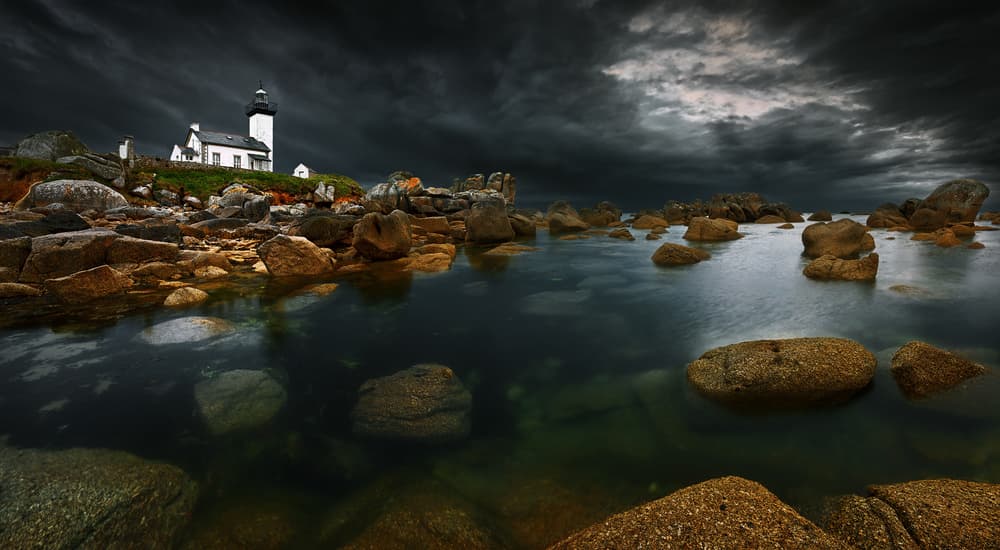 Dramatic Coastal Lighthouse by Krzysztof Browko — canvas wall art