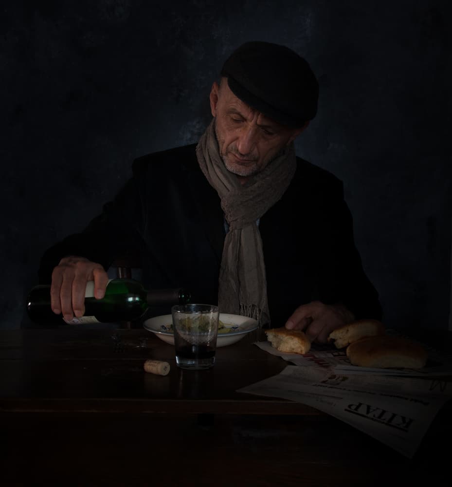Solitary Man Pours Wine by Ramiz Sahin — canvas wall art