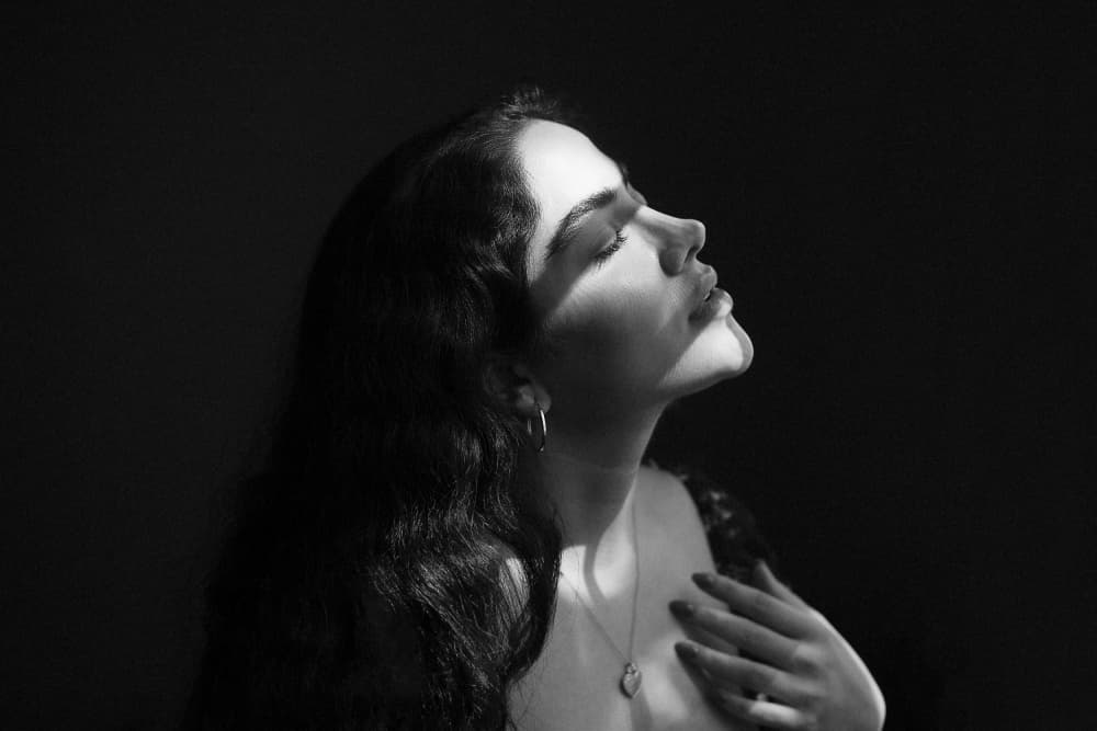 Serene Woman's Profile by Mehdi Mokhtari — canvas wall art