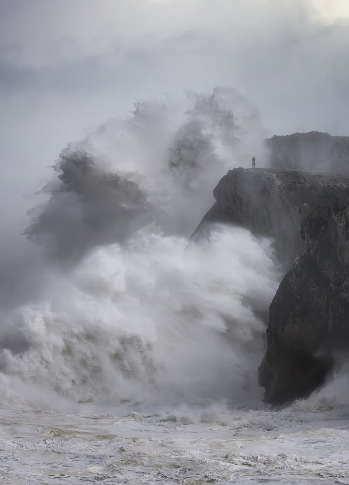 Man on Stormy Cliff by Rodrigo Núñez Buj — canvas wall art