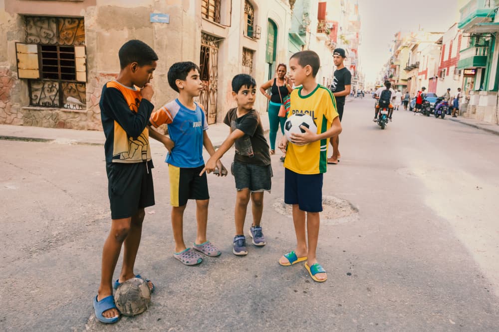 Street Soccer Kids by ZY Zhang — canvas wall art