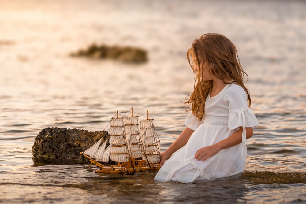 Girl and Ship at Sunset by Joško Šimic — canvas wall art