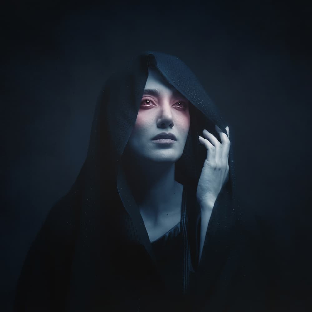 Mysterious Hooded Woman by Moein Hasheminasab — canvas wall art