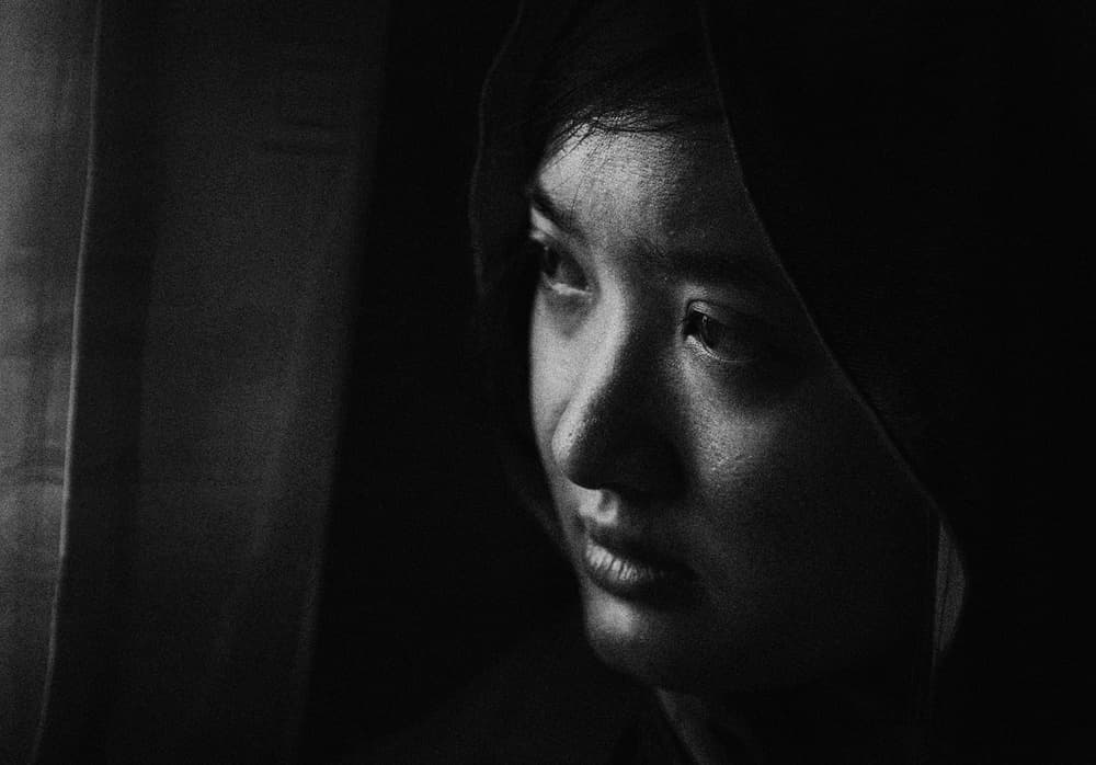 Pensive Woman Portrait by Andi Halil — canvas wall art