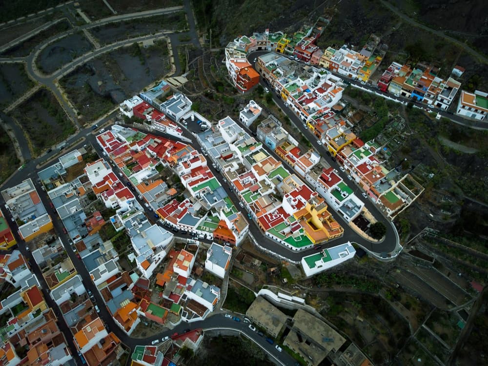 Colorful Hillside Town by Primož Kožuh — canvas wall art