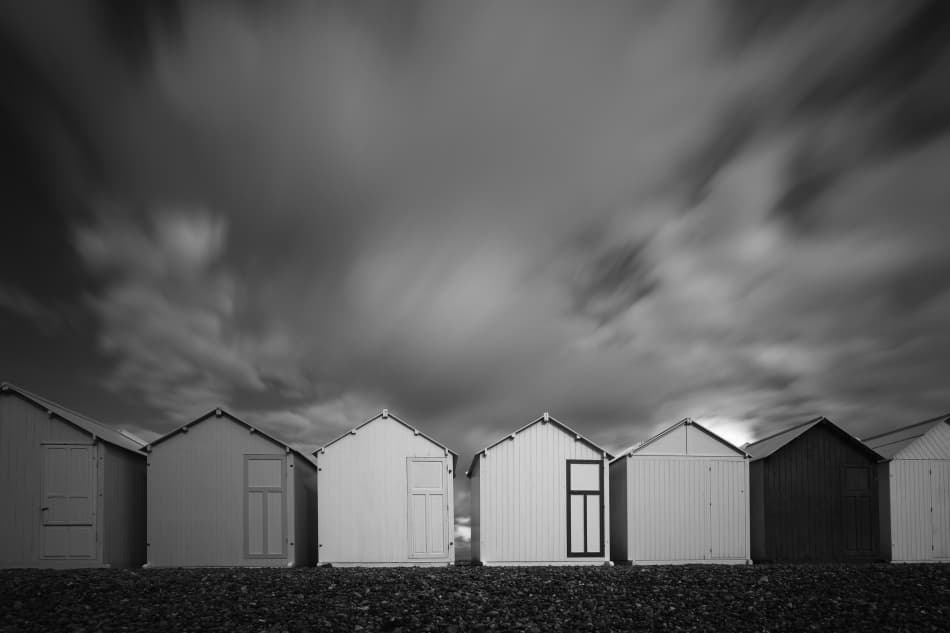 Coastal Huts Moving Clouds by Massimo Della Latta — canvas wall art
