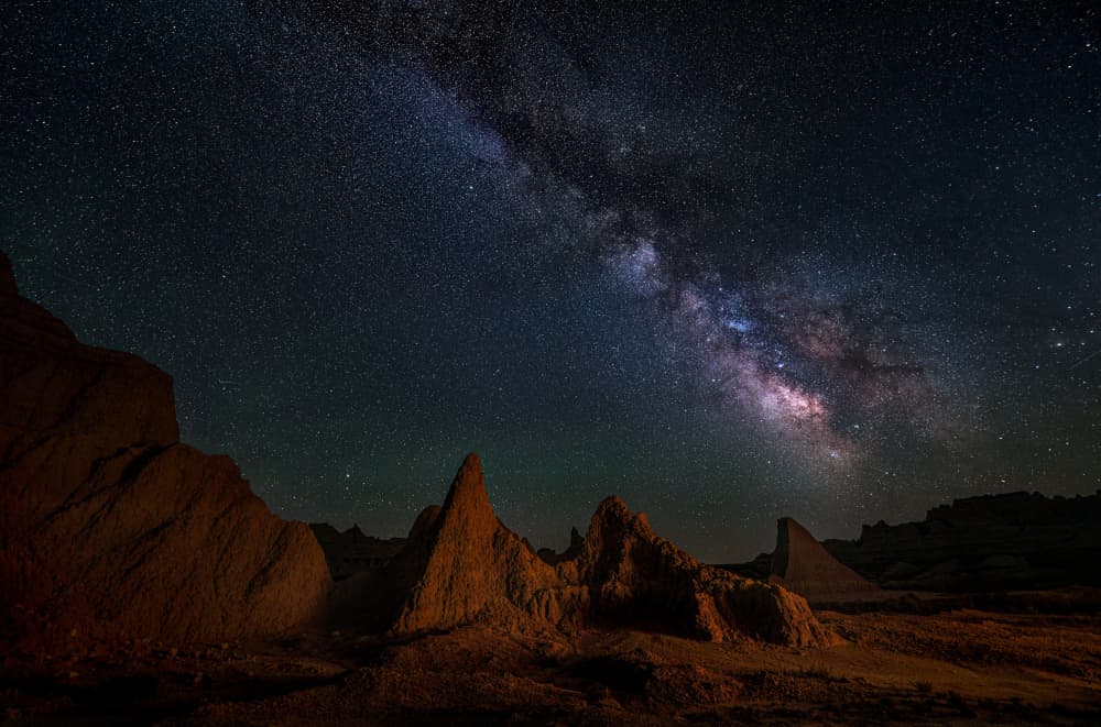 Milky Way Over Badlands by Ruiqing P. — canvas wall art