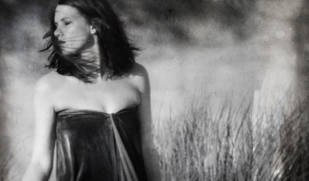 Windblown Woman Grass by Charlaine Gerber — canvas wall art