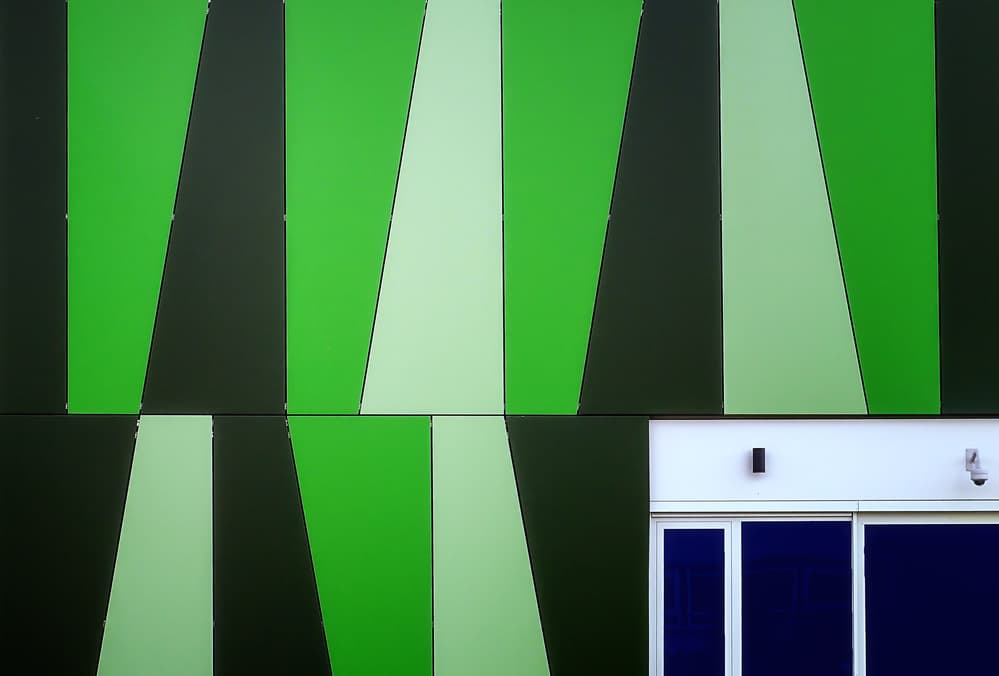 Green Geometric Facade by Henk van Maastricht — canvas wall art