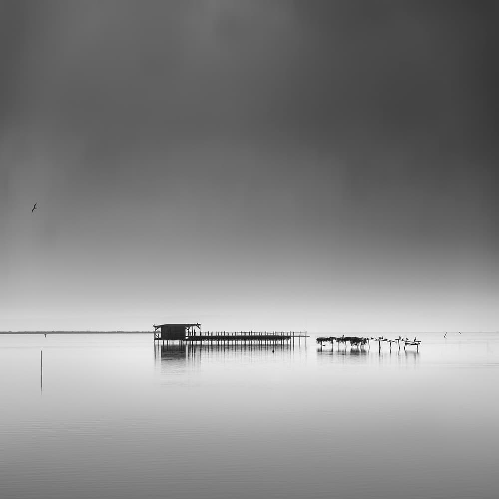 Moody Pier Reflection by George Digalakis — canvas wall art