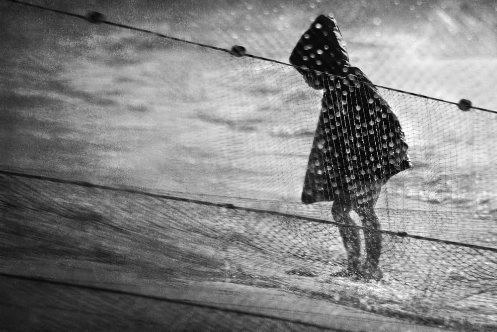 Hooded Child and Net by Ekkachai Khemkum — canvas wall art