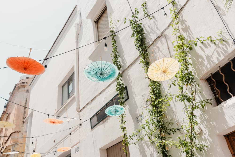 Colorful Street Umbrellas by Photolovers — canvas wall art