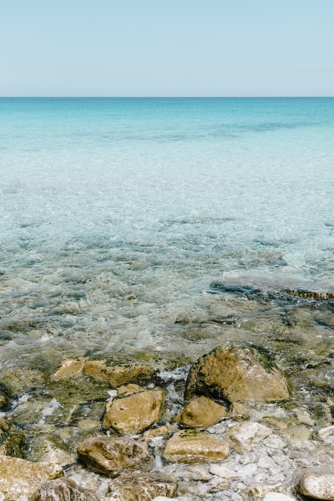 Clear Turquoise Ocean by Photolovers — canvas wall art
