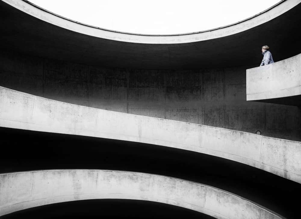 Urban Curves and Man by Michael Allmaier — canvas wall art