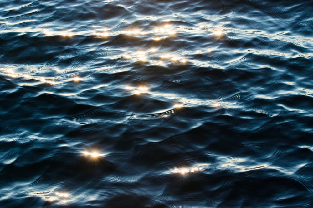 Glimmering Blue Water by EMELIEmaria — canvas wall art