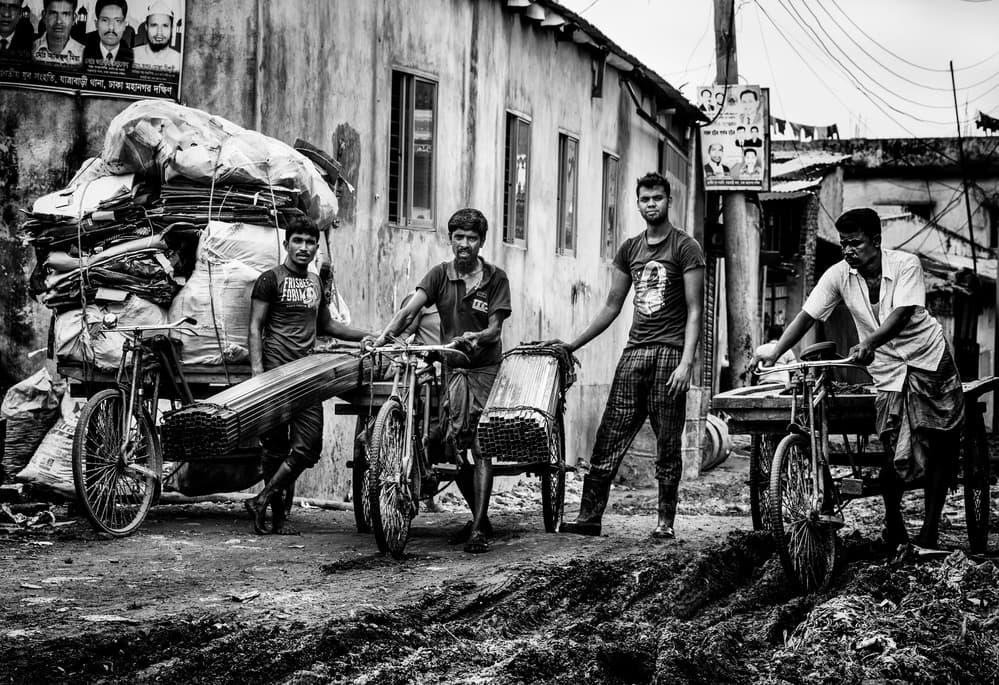 Working Men Street Scene by Joxe Inazio Kuesta Garmendia — canvas wall art
