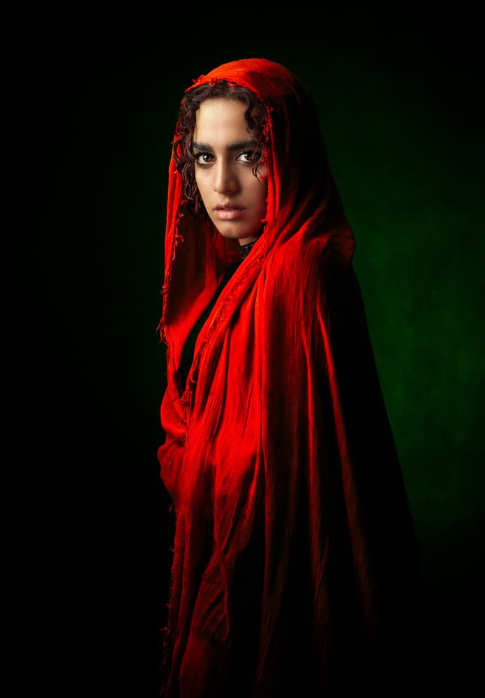 Woman in Red Hood by Mehdi Mokhtari — canvas wall art