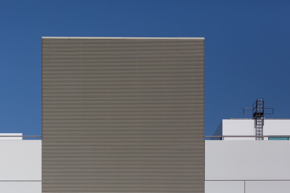 Geometric Building Blue Sky by Jan Niezen — canvas wall art