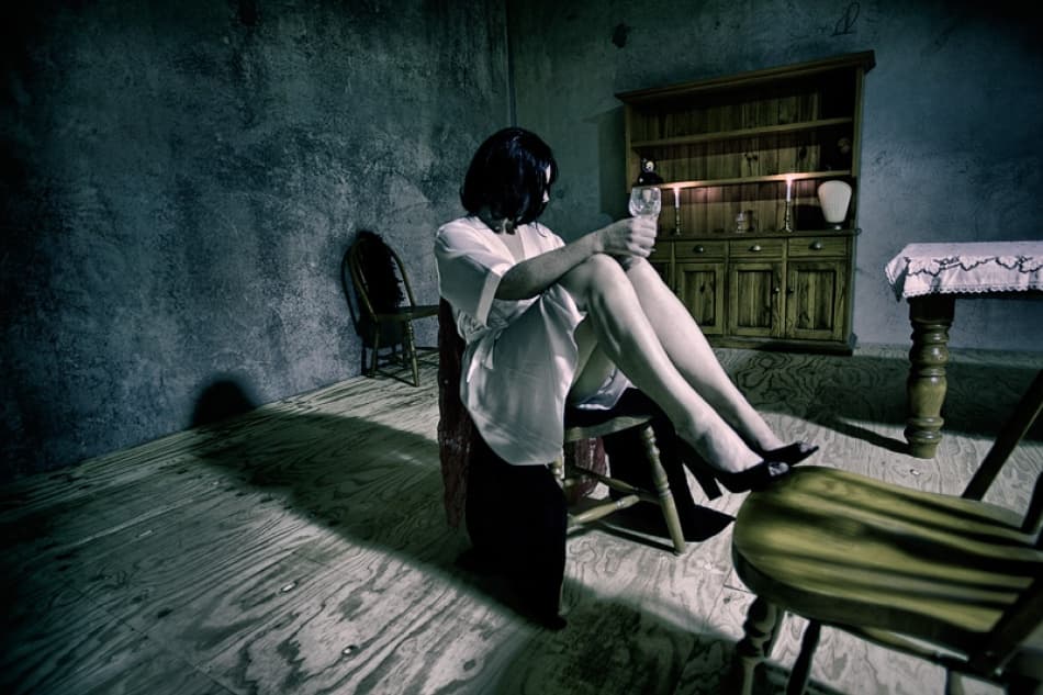 Pensive Woman Dark Room by Mel Brackstone — canvas wall art