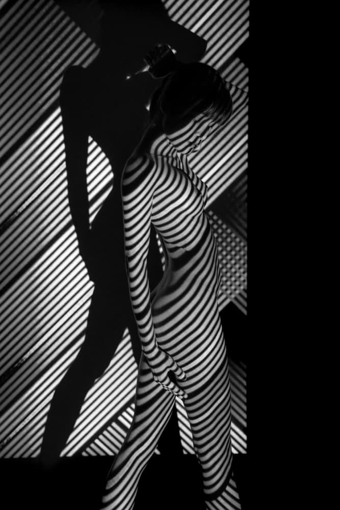 Striped Figure Silhouette by ADIREK M — canvas wall art