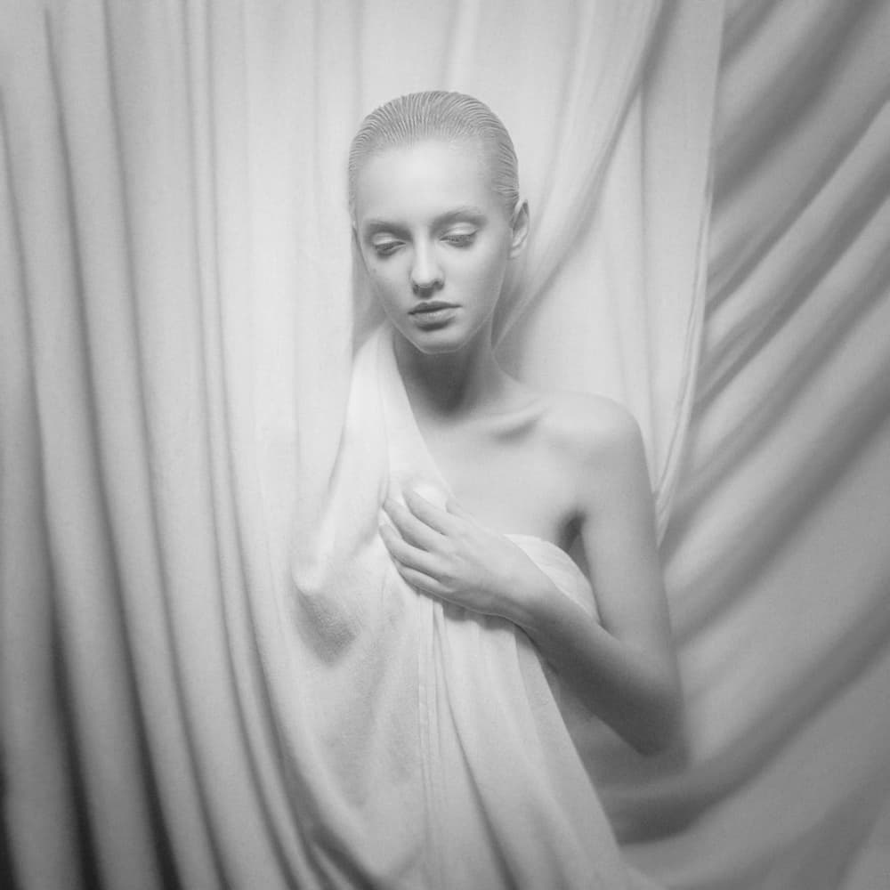 Serene Woman In Drapes by Yuri Shevchenko — canvas wall art