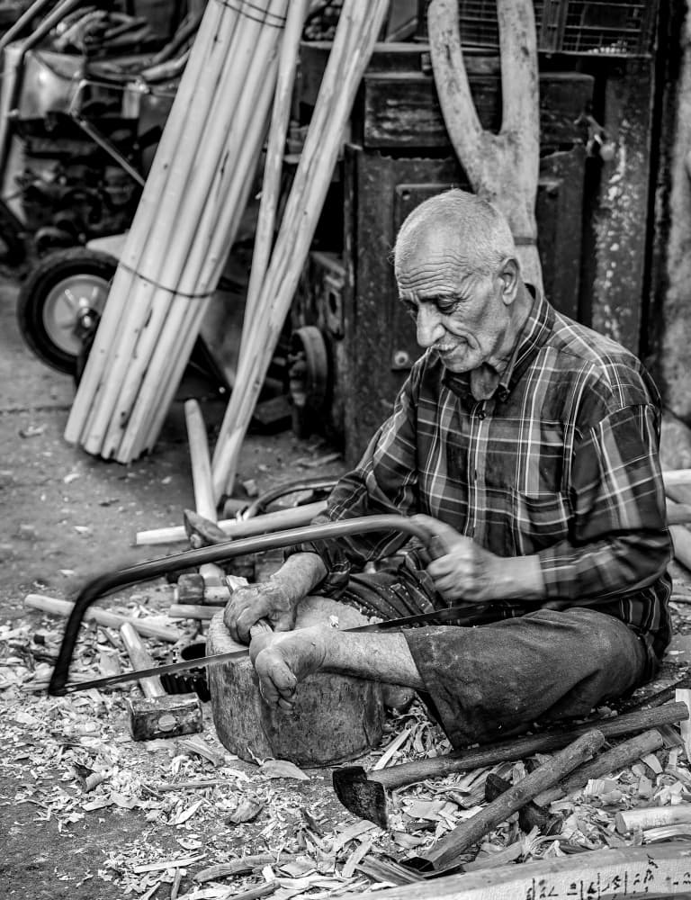 Skilled Wood Craftsman by Bashar Alsofey — canvas wall art